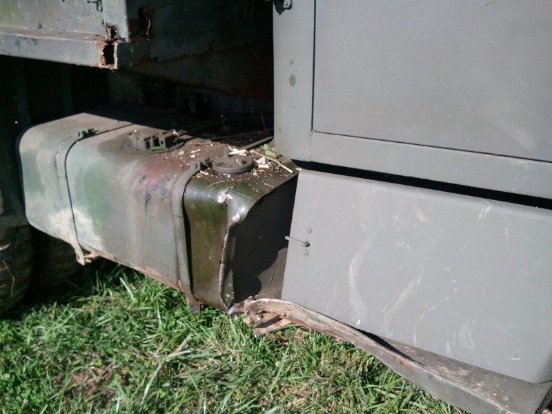 Here is the damage to the battery box and fuel tank from Bounty Hill.